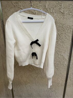 Aqua Cream V-Neck Sweater with Black Bow Accents